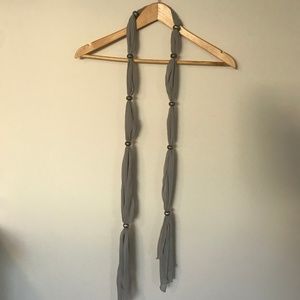 Chic grey scarf with silver details